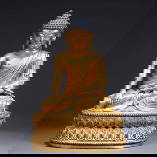 A GILT BRONZE SHAKYAMUNI STATUE: Gilt Bronze Shakyamuni Statue