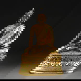 A GILDED BRONZE STATUE OF SHAKYAMUNI BUDDHA IN THE STYLE OF ZANABAZAR: Gilded bronze statue of Shakyamuni Buddha in the style of Zanabazar