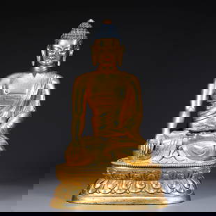 A GILT BRONZE SHAKYAMUNI STATUE: Gilt Bronze Shakyamuni Statue