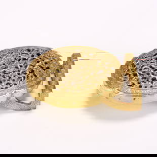 A GILDED BRONZE FLORAL DRAGON PATTERN BELT BUCKLE: Gilded bronze floral dragon pattern belt buckle