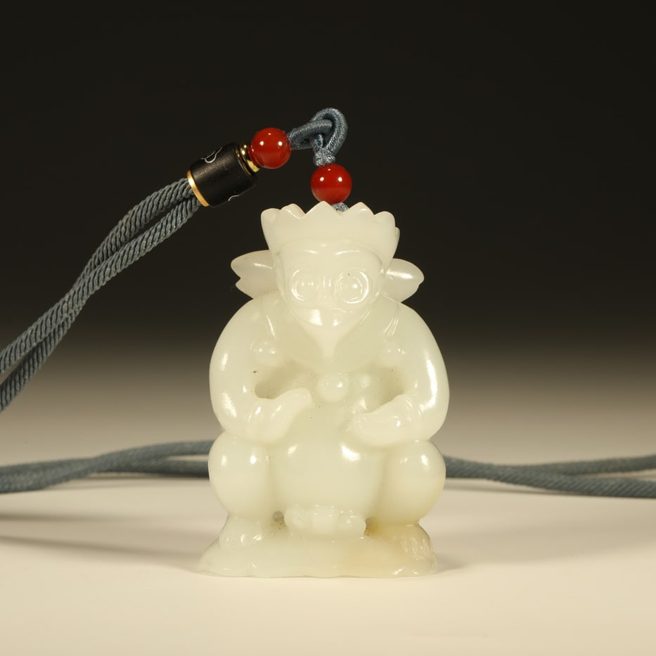A HETIAN JADE PENDANT OF A ROC (GREAT PENG BIRD): Hetian jade pendant of a roc (Great Peng bird)