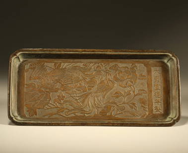 A BRONZE PLATE CARVED WITH PHOENIX AND PEONY MOTIF: Bronze plate carved with phoenix and peony motif