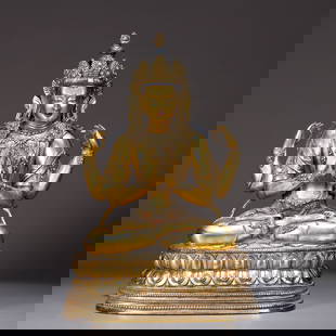 A GILT BRONZE FOUR-ARMED GUANYIN STATUE: Gilt Bronze Four-Armed Guanyin Statue
