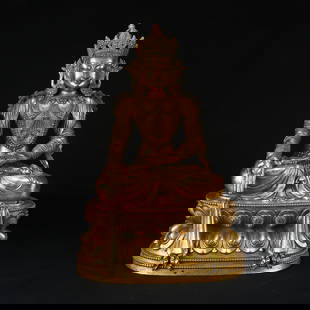 A GILT BRONZE BHAISAJYAGURU (MEDICINE BUDDHA) STATUE: Gilt bronze Bhaisajyaguru (Medicine Buddha) statue