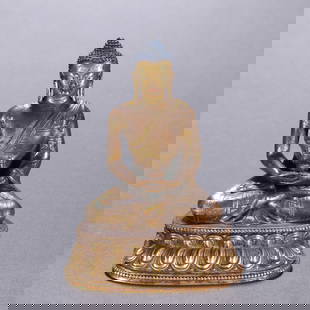 A PREVIOUSLY OWNED GILT-BRONZE SHAKYAMUNI BUDDHA STATUE: Previously owned gilt-bronze Shakyamuni Buddha statue