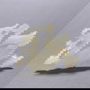 A HAN DYNASTY HETIAN JADE PHOENIX BIRD CARVING: Han Dynasty Hetian jade phoenix bird carving