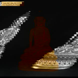 A GILT BRONZE FIGURE OF SHAKYAMUNI BUDDHA: Gilt Bronze Figure of Shakyamuni Buddha