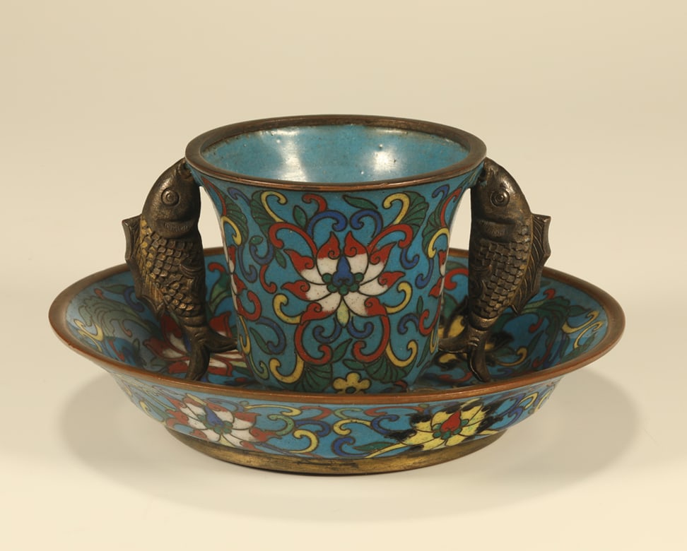 A CLOISONNE ENAMEL CUP WITH SCROLLING FLOWERS AND DOUBLE FISH DESIGN: Cloisonne Enamel Cup with Scrolling Flowers and Double Fish Design