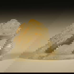 A HETIAN JADE AND CAVE STONE MOUNTAIN SCULPTURE WITH AUSPICIOUS BEAST DESIGN: Hetian jade and cave stone mountain sculpture with auspicious beast design
