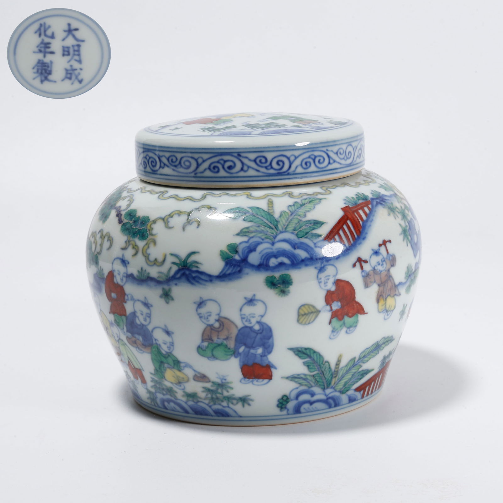 A DOUCAI COVERED JAR WITH CHILDREN AT PLAY MOTIF: Doucai covered jar with children at play motif