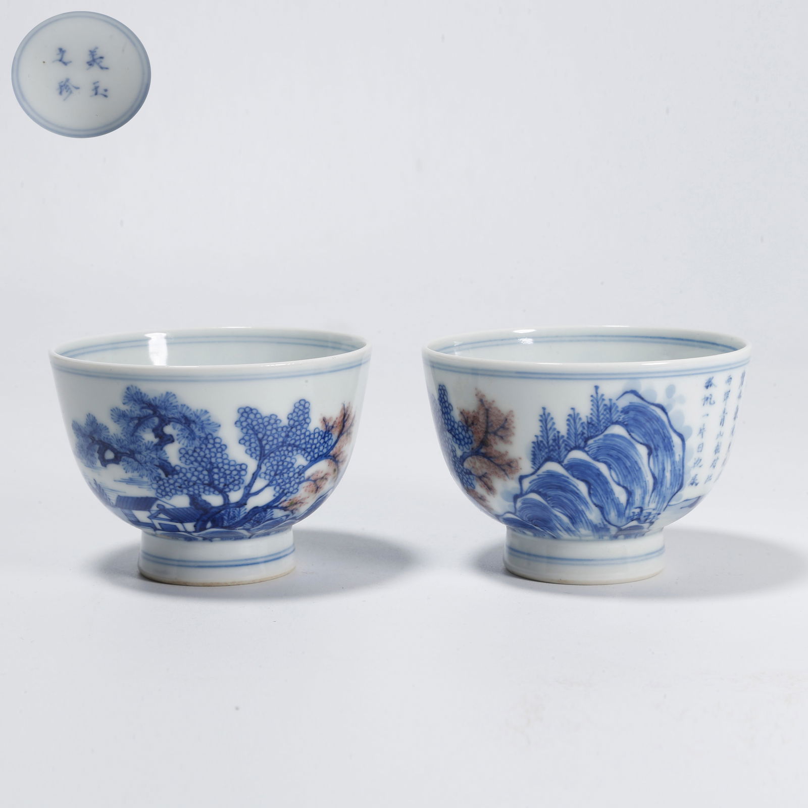 A PAIR OF BLUE-AND-WHITE CUPS WITH LANDSCAPE DESIGN: Pair of blue-and-white cups with landscape design