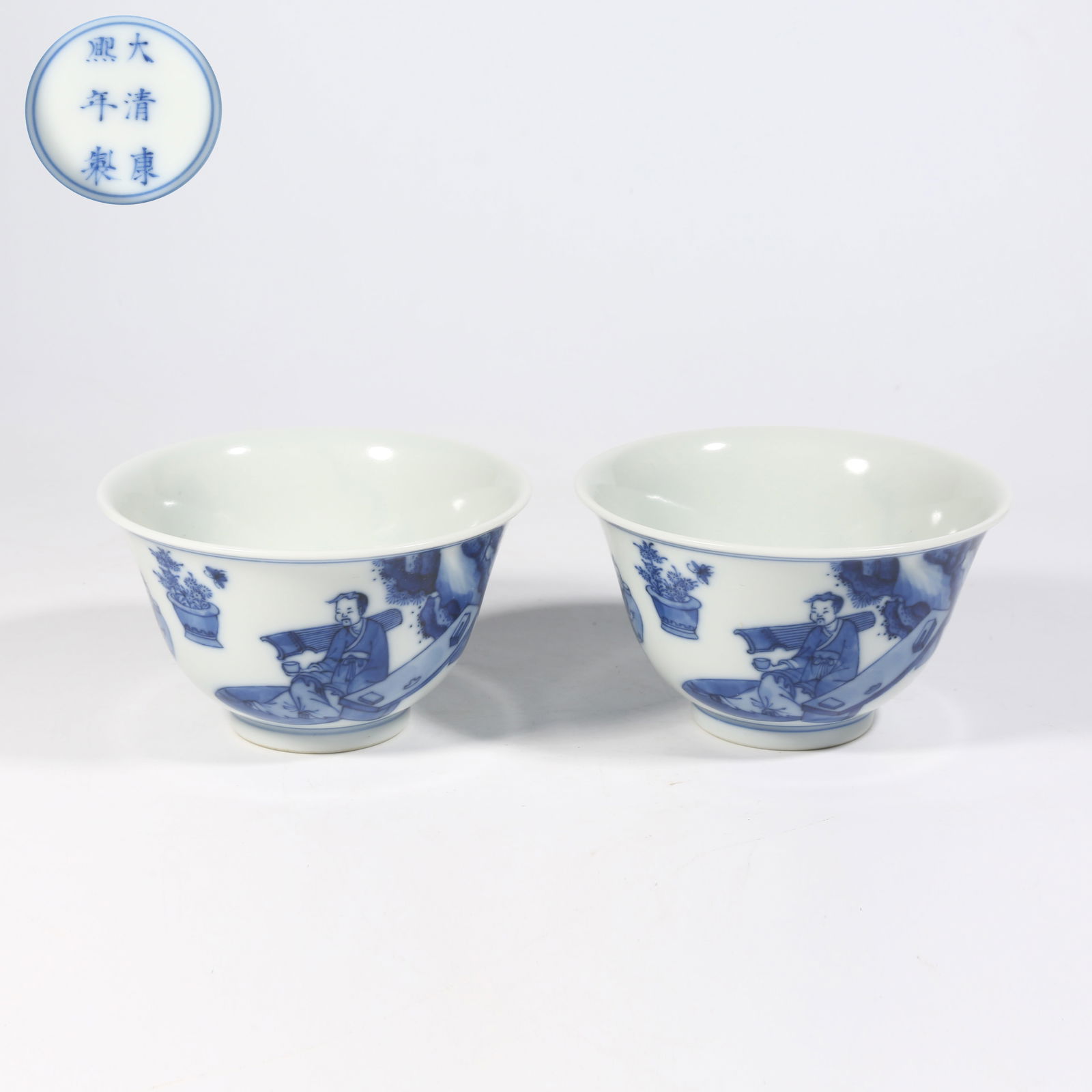 A SET OF BLUE AND WHITE HIGH-RANKING SCHOLAR THUMB REST CUPS: Set of blue and white high-ranking scholar thumb rest cups