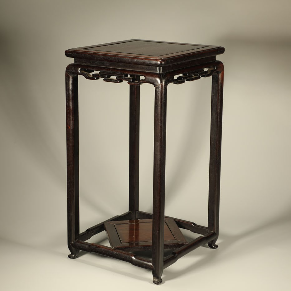 A ZITAN WOOD FLOWER TABLE: Zitan Wood Flower Table