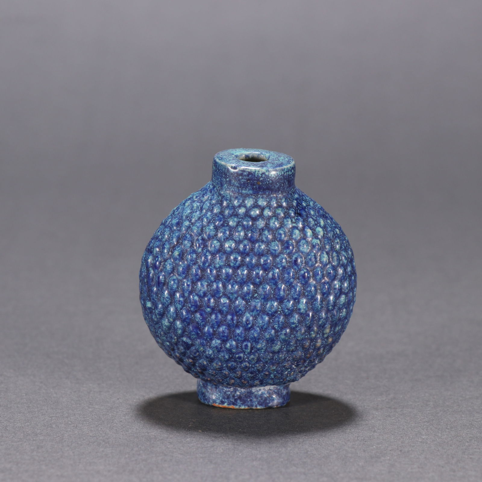 A QING DYNASTY LU JUN-GLAZED SNUFF BOTTLE WITH WICKER PATTERN: Qing Dynasty Lu Jun-Glazed Snuff Bottle with Wicker Pattern