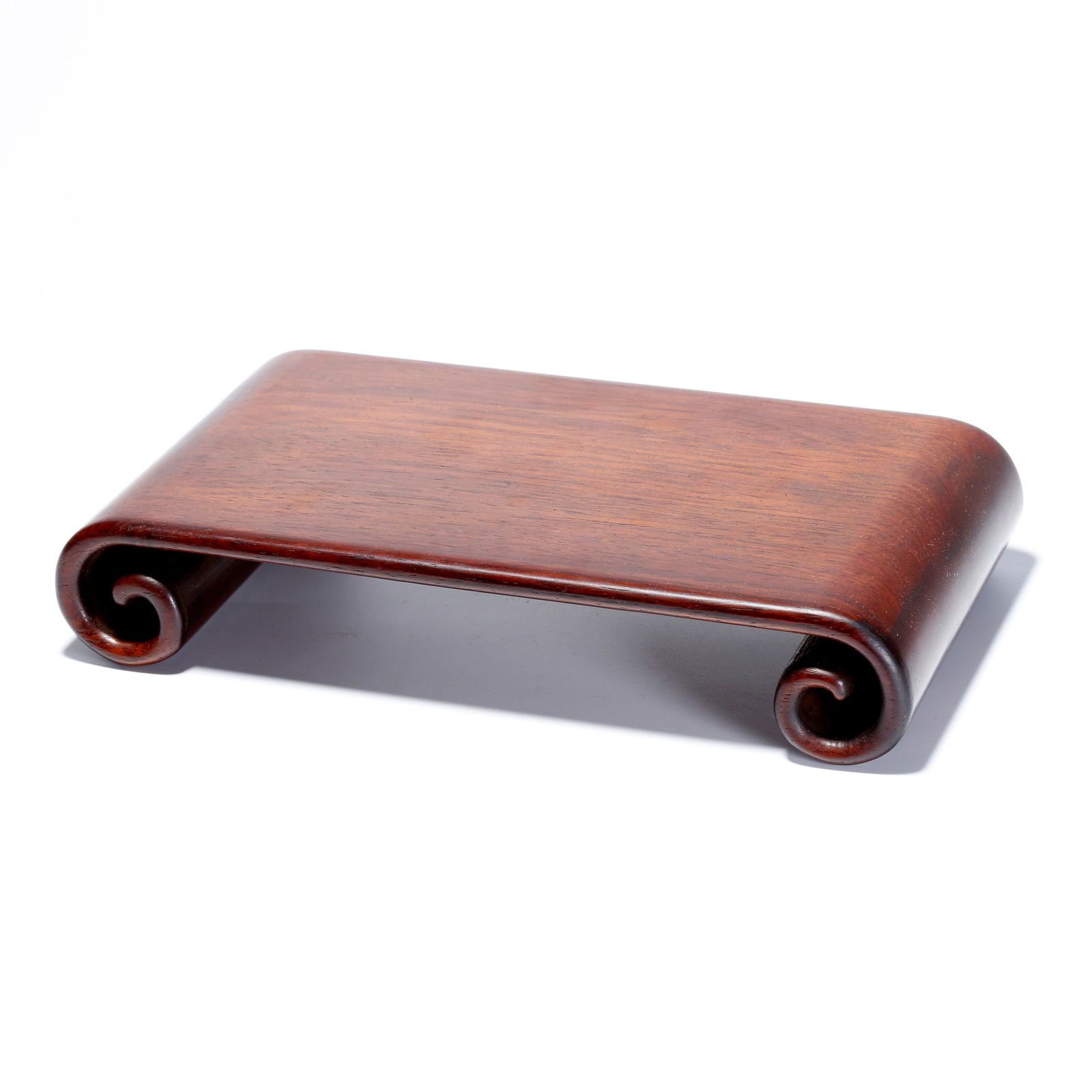 A HUANGHUALI WOOD CARVED SMALL TEA TABLE: Huanghuali Wood Carved Small Tea Table