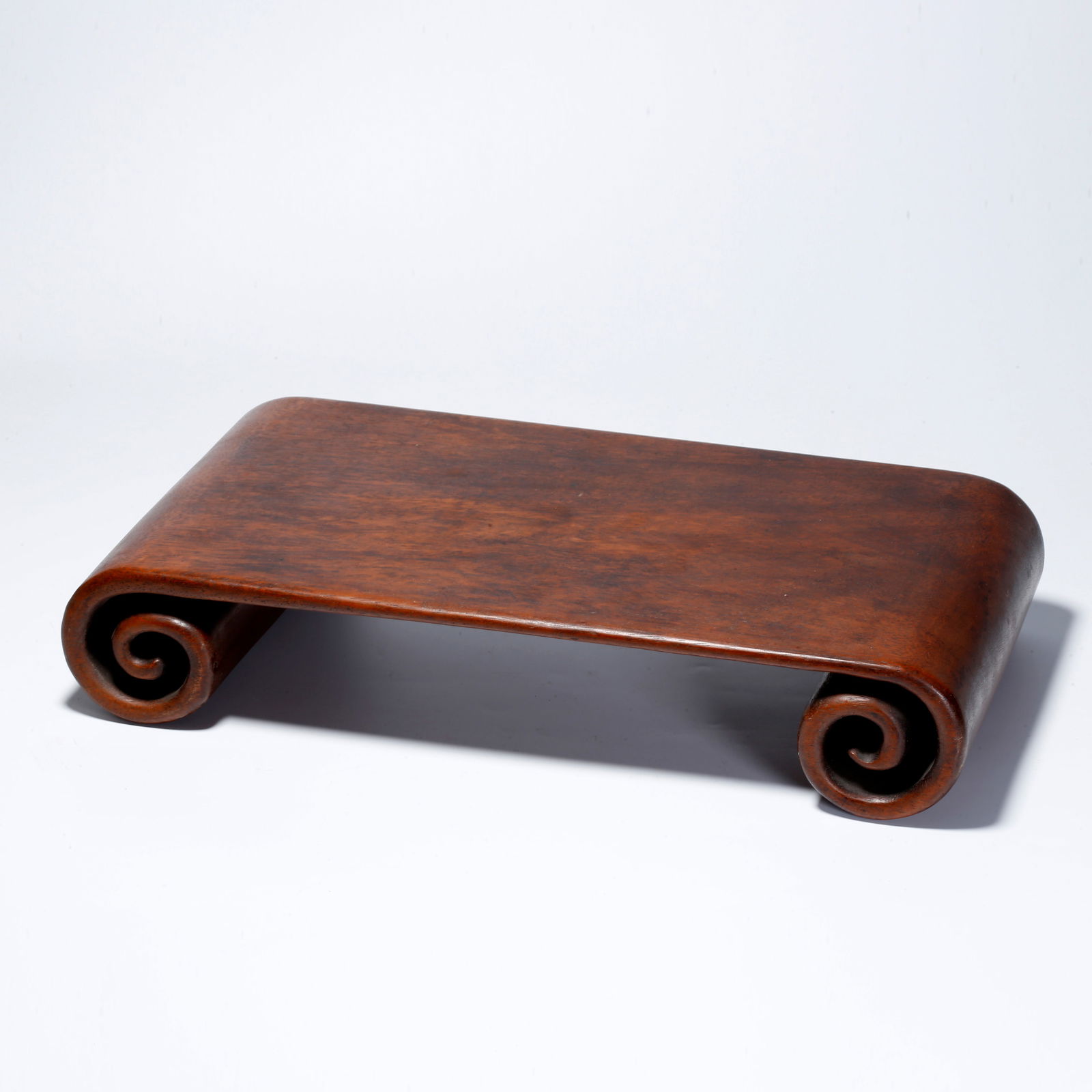 A HUANGHUALI WOOD CARVED TEA TABLE: Huanghuali Wood Carved Tea Table