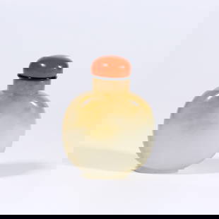 A HETIAN WHITE JADE SNUFF BOTTLE: Hetian White Jade Snuff Bottle