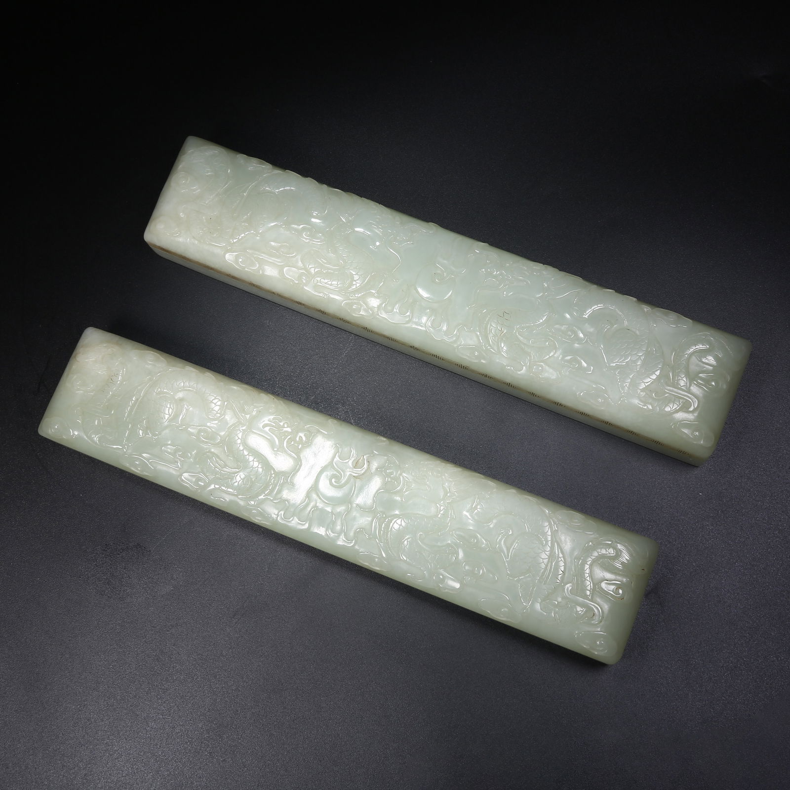 A HETIAN JADE SET OF PAPERWEIGHTS INSCRIBED WITH IMPERIAL POETRY: Hetian jade set of paperweights inscribed with imperial poetry