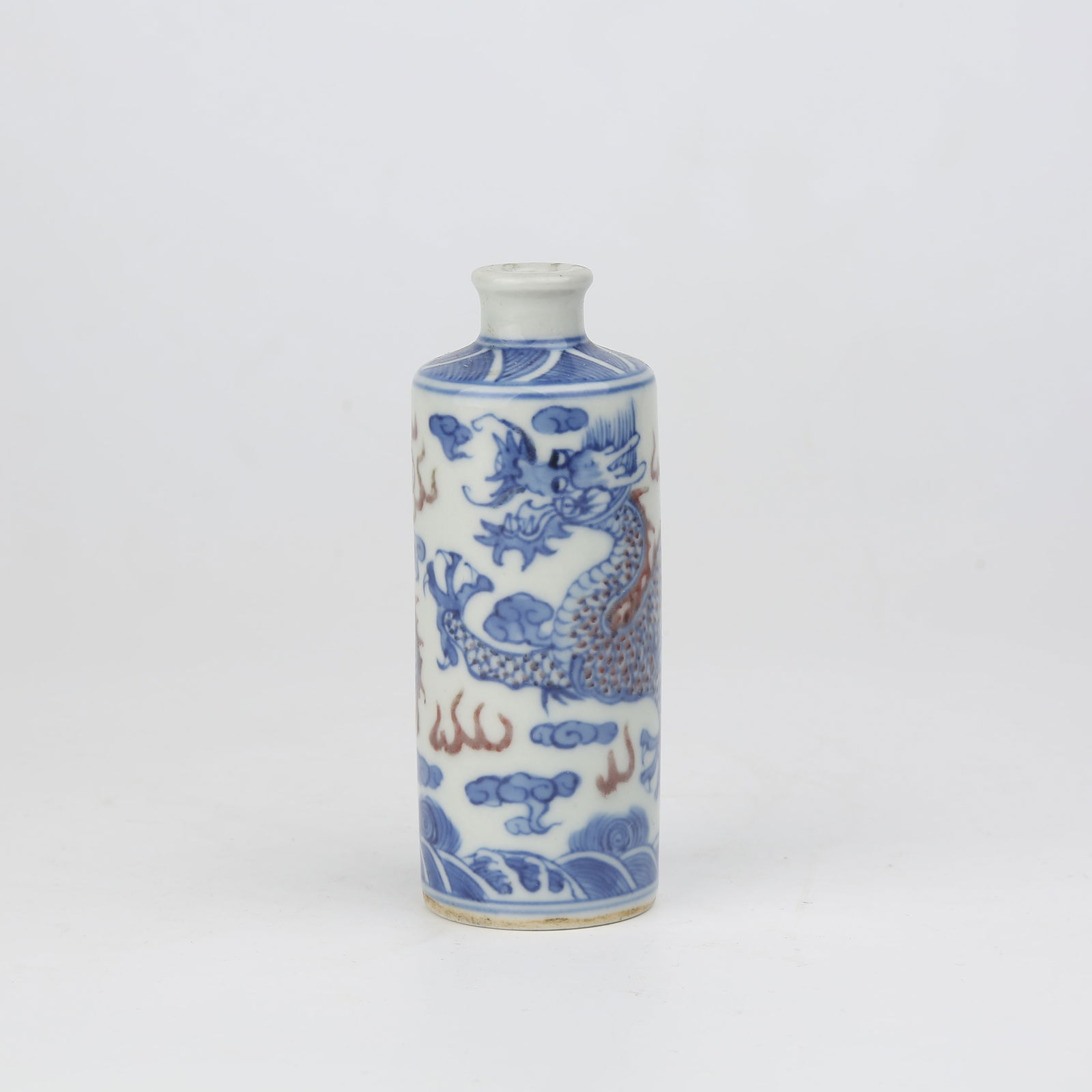 A BLUE AND WHITE WITH UNDERGLAZE RED SNUFF BOTTLE WITH CLOUD AND DRAGON CHASING PEARL DESIGN (1 of 9)