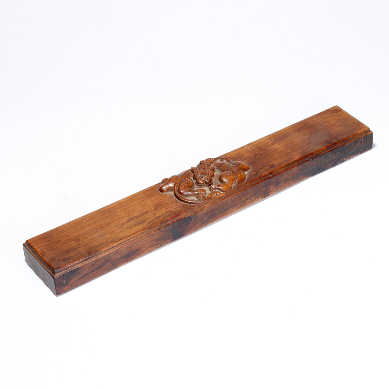 A HUANGHUALI WOOD CARVED CHILONG PATTERN PAPERWEIGHT: Huanghuali Wood Carved Chilong Pattern Paperweight