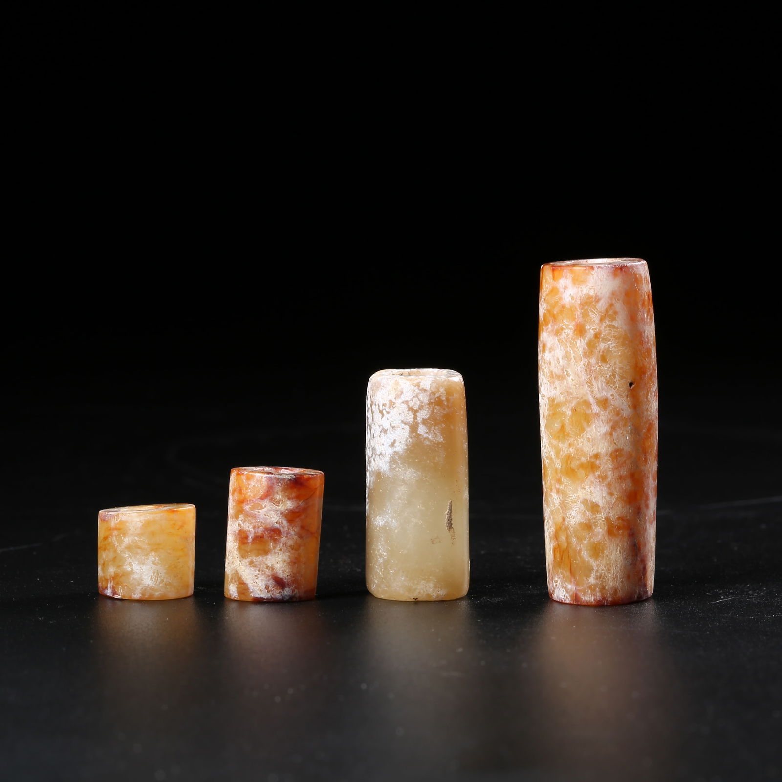 A SET OF ANTIQUE JADE BELT HOOKS: Set of antique jade belt hooks