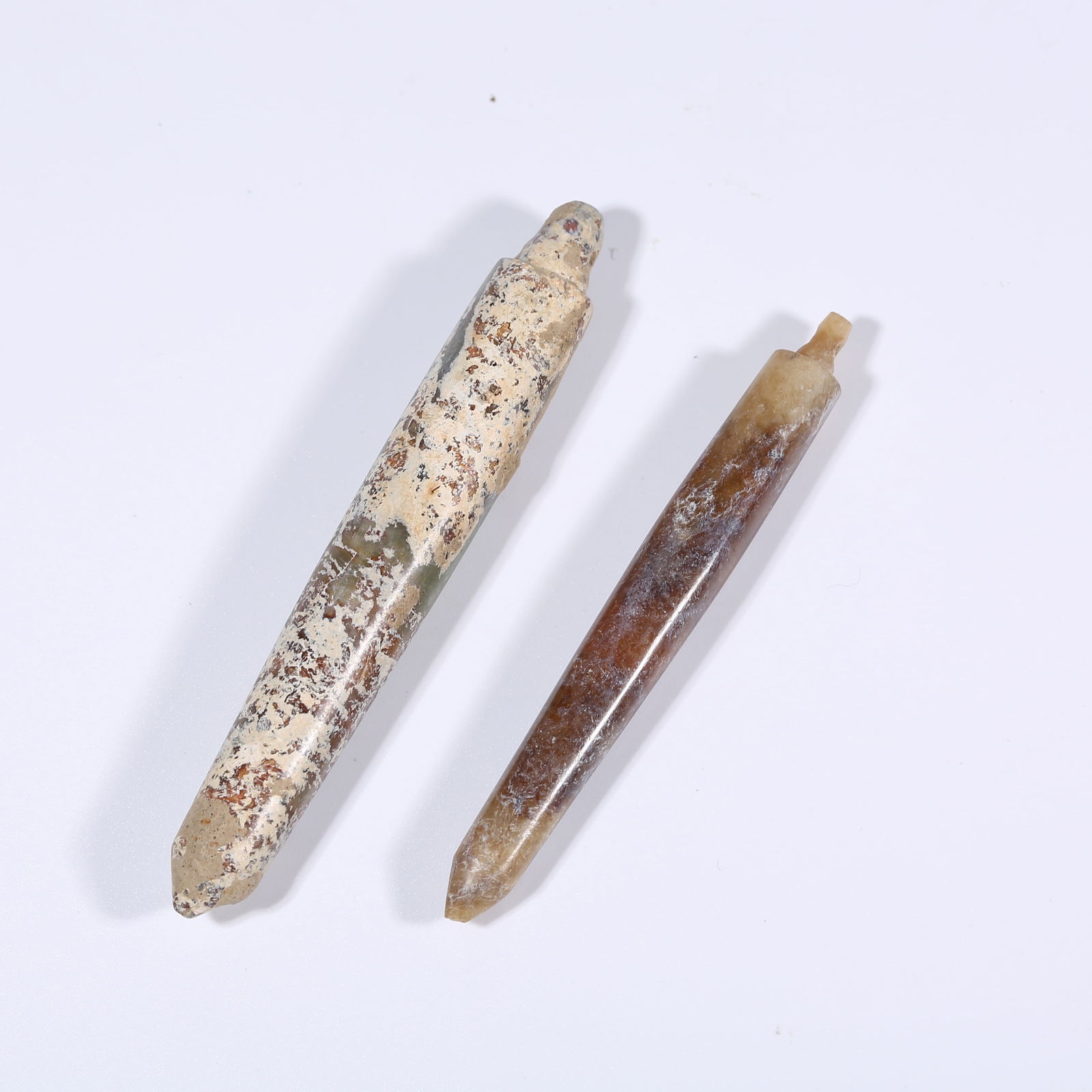 A SET OF ANTIQUE JADE CONICAL OBJECTS: Set of antique jade conical objects