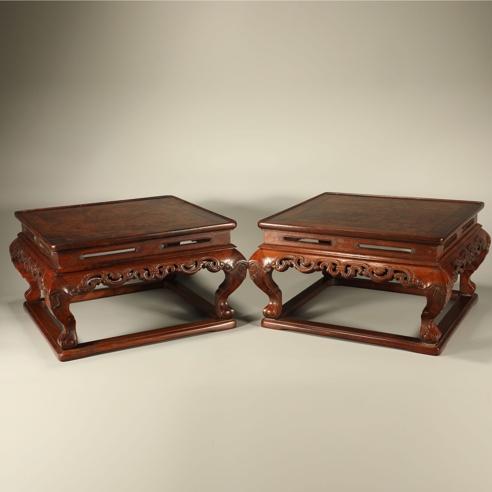 A PAIR OF HUANGHUALI FLOWER TABLES INLAID WITH CHERRYWOOD: Pair of Huanghuali flower tables inlaid with cherrywood