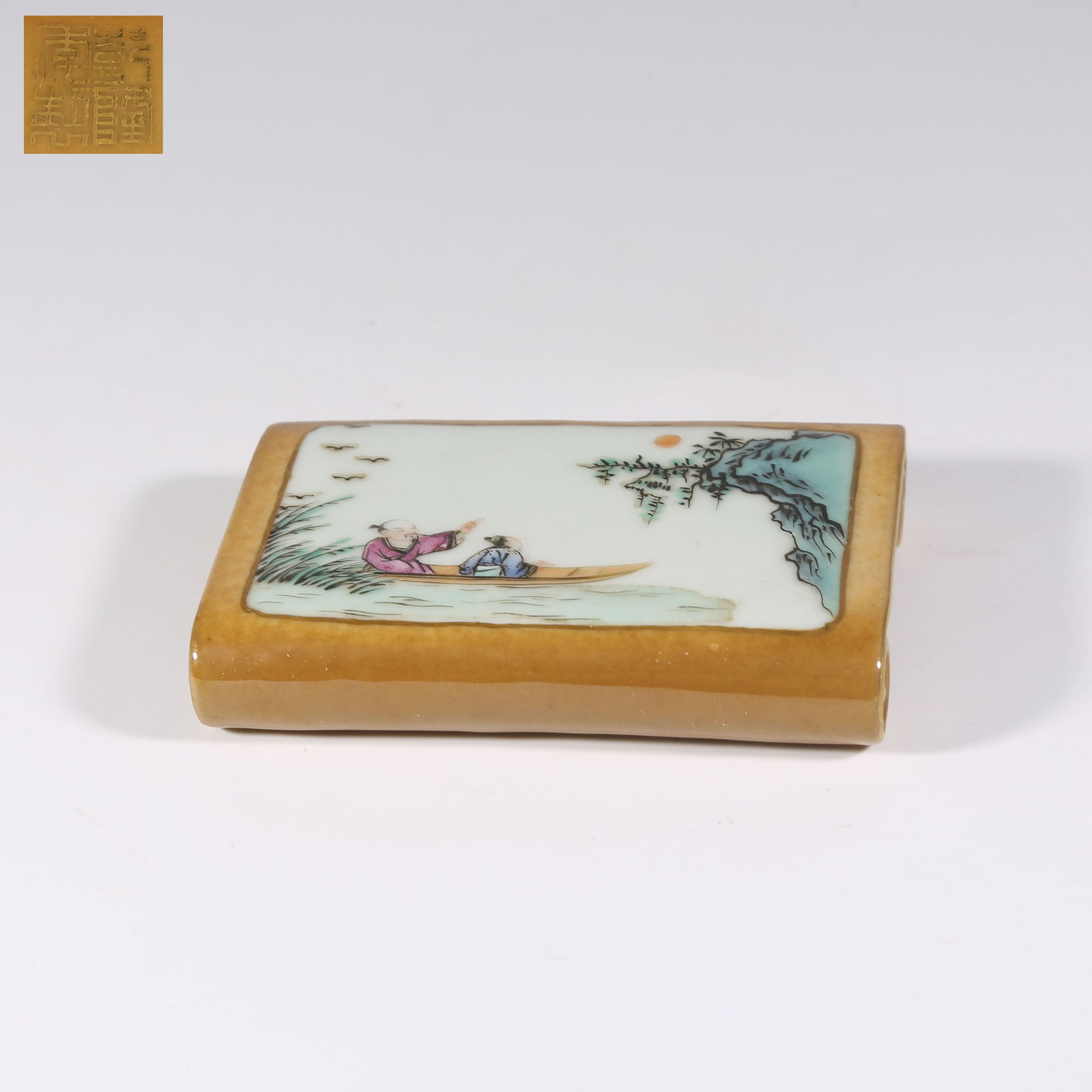 A PURPLE-GOLD GLAZED OPEN-WINDOW FAMILLE-ROSE INKSTONE BOX WITH BOATING SCENE: Purple-Gold Glazed Open-Window Famille-Rose Inkstone Box with Boating Scene