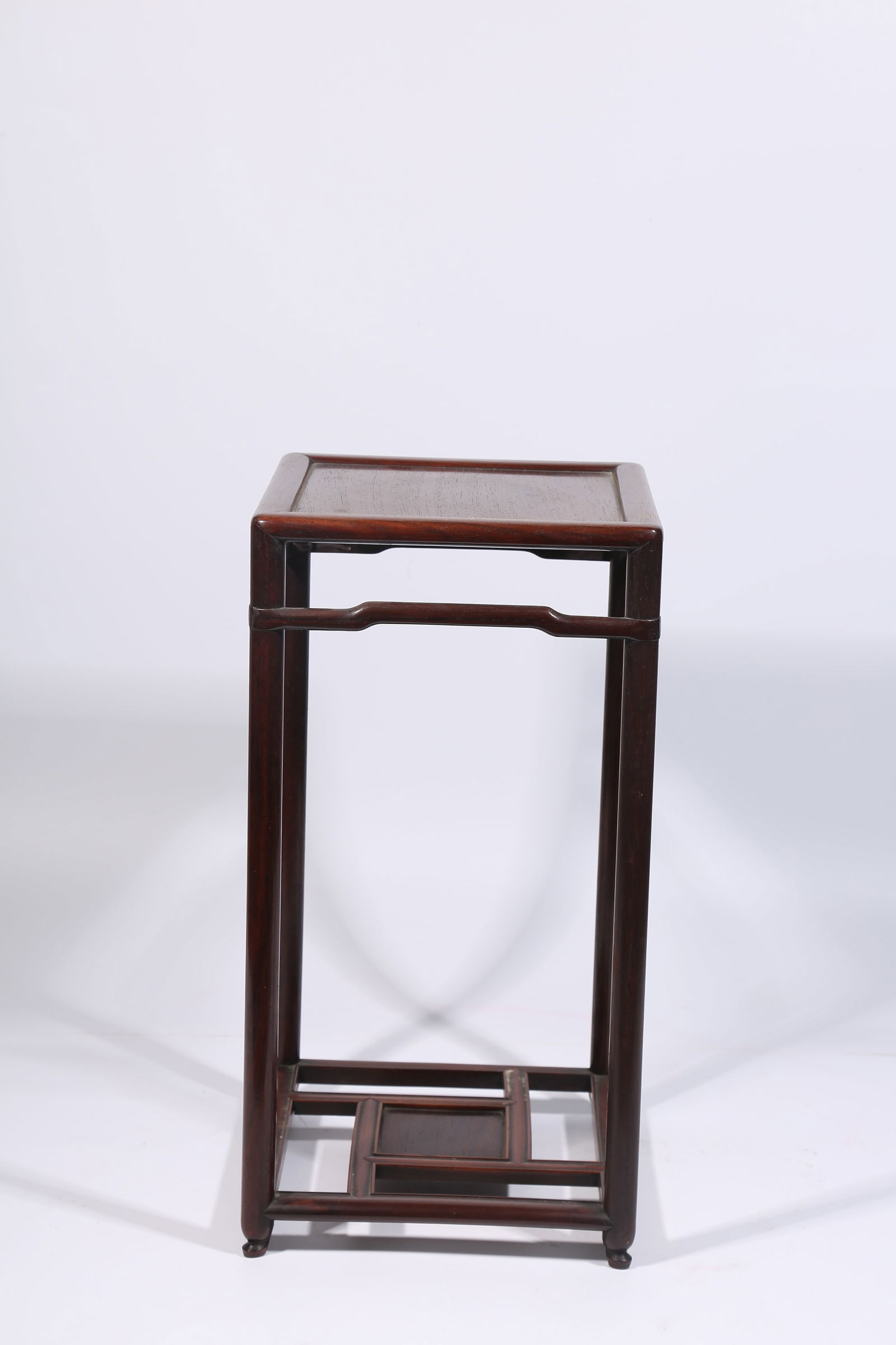 A HUANGHUALI FLOWER TABLE: Huanghuali flower table