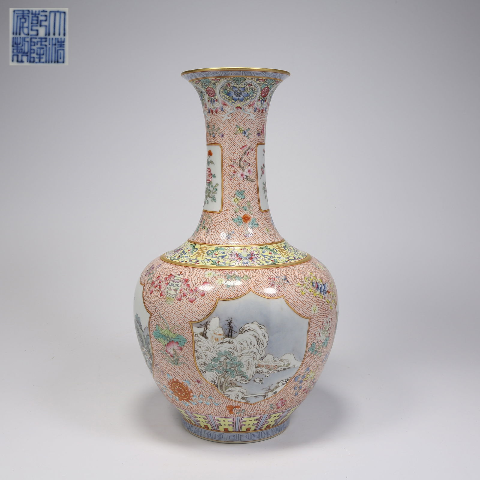 A FAMILLE ROSE VASE WITH LANDSCAPE PATTERN AND BROCADE GROUND WITH OPEN WINDOWS: Famille rose vase with landscape pattern and brocade ground with open windows