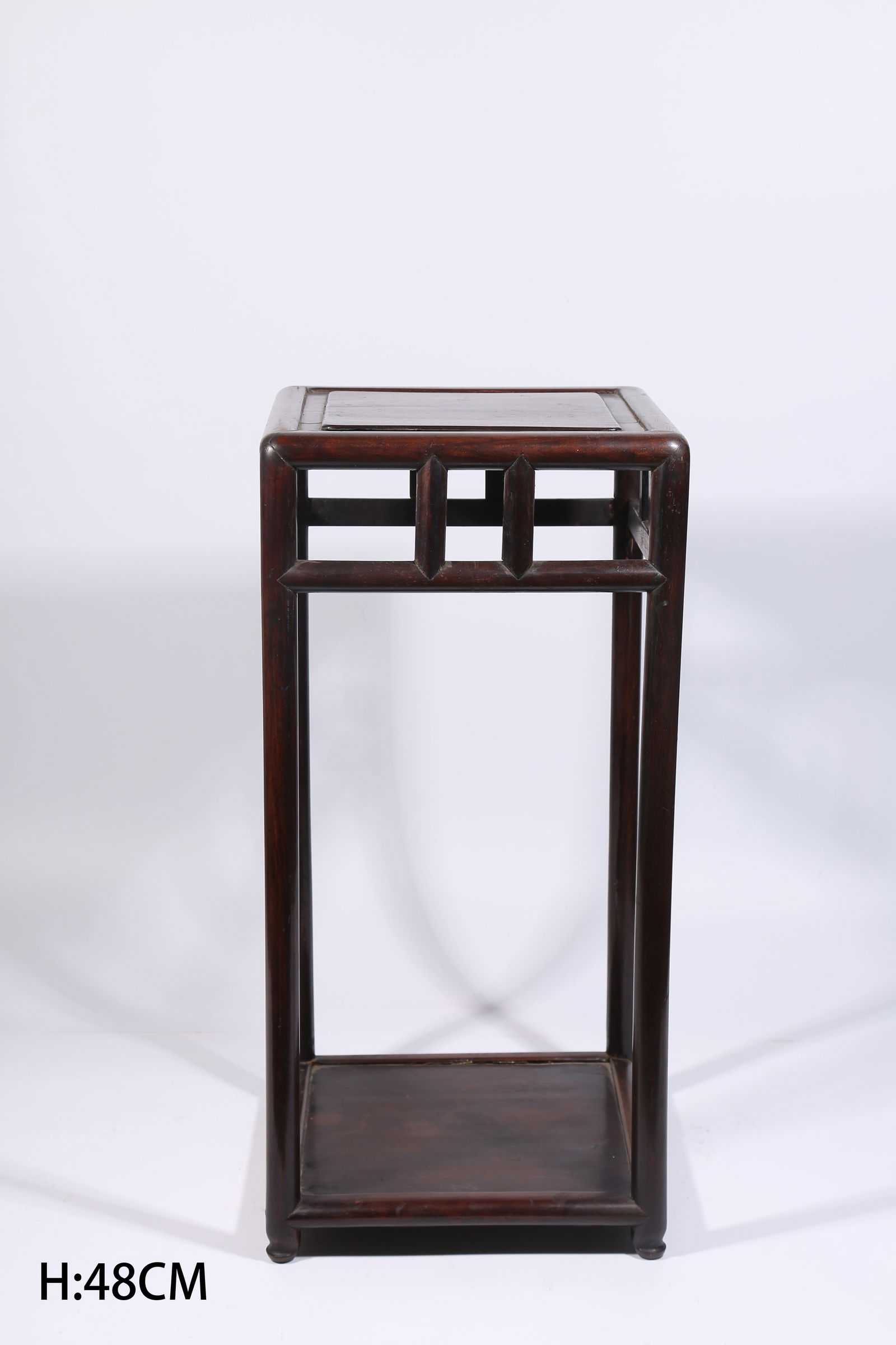 A HUANGHUALI FLOWER TABLE: Huanghuali flower table