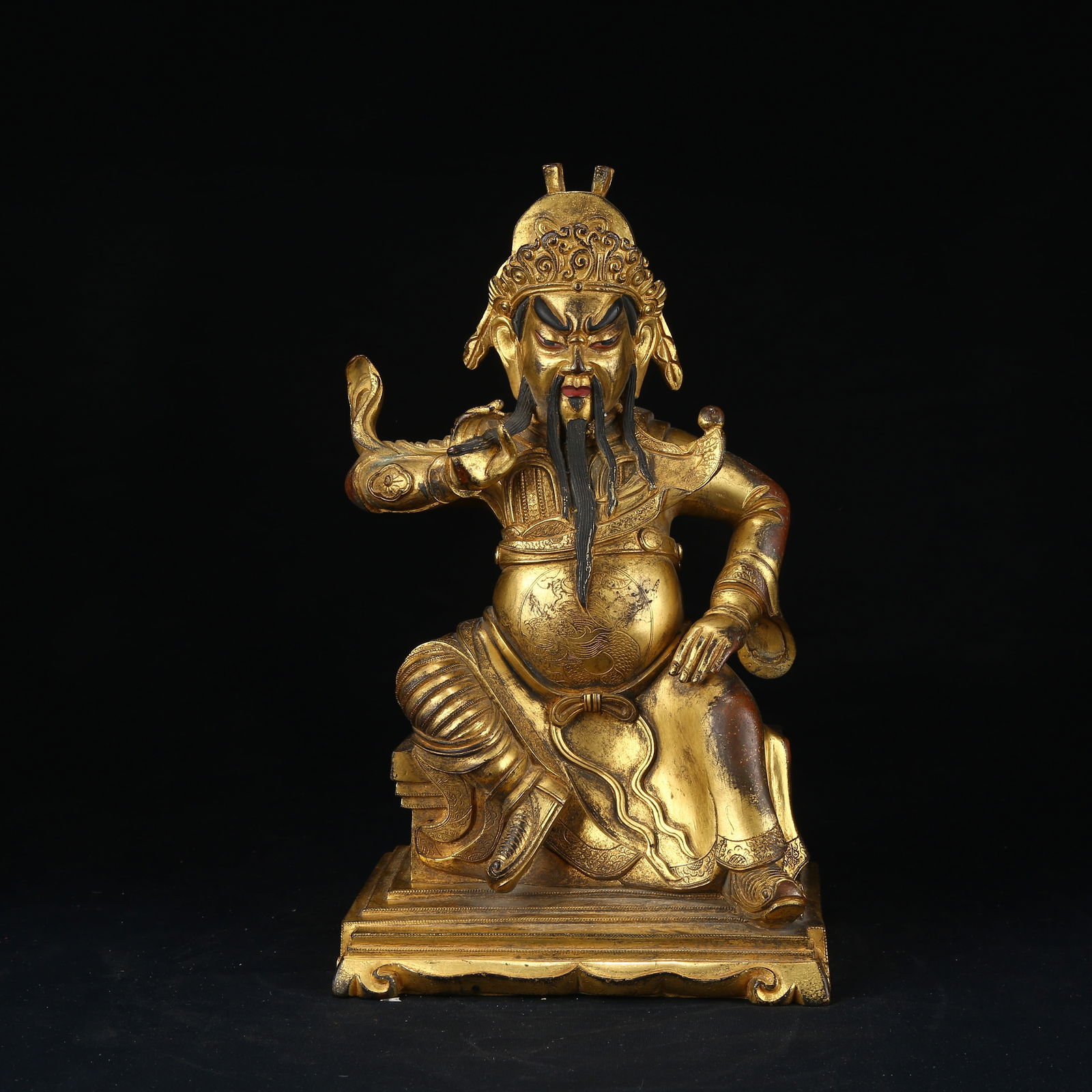 A GILT BRONZE GUAN YU STATUE: Gilt bronze Guan Yu statue