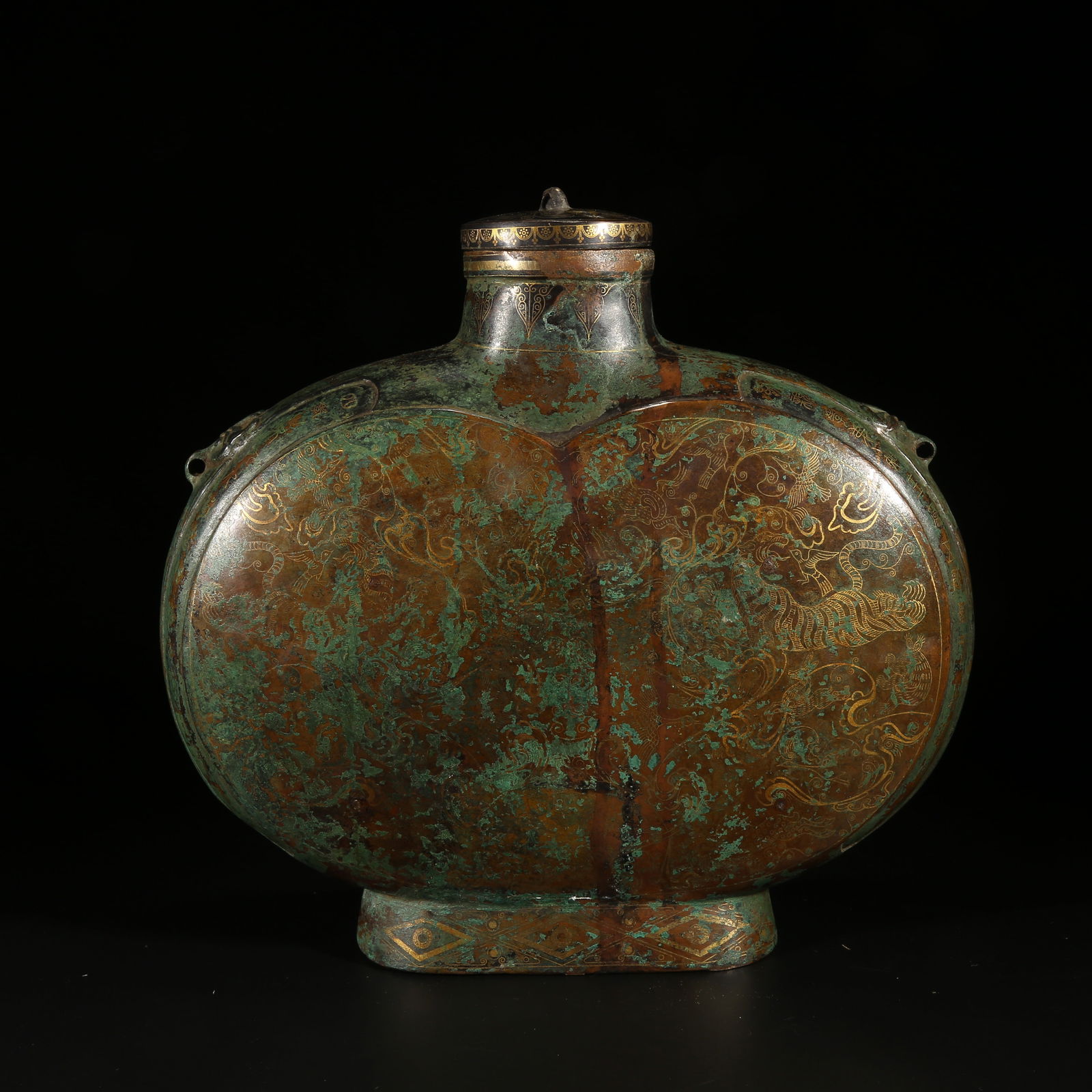 A GILT BRONZE FLAT EWER WITH AUSPICIOUS BEAST PATTERN: Gilt Bronze Flat Ewer with Auspicious Beast Pattern