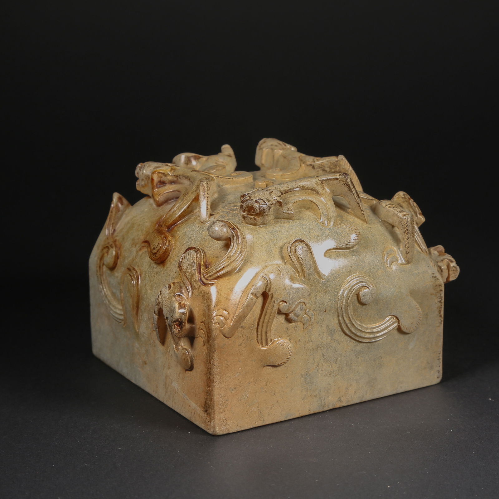 A HETIAN JADE CHI-DRAGON SEAL: Hetian jade chi-dragon seal