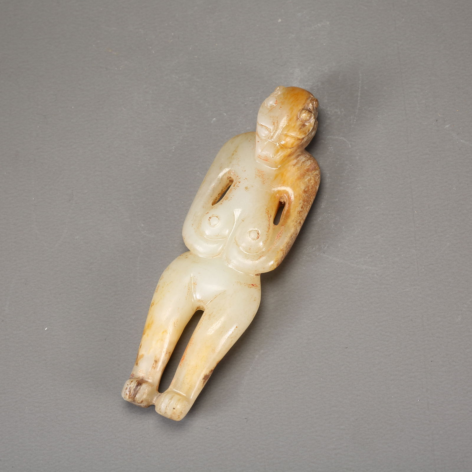 A ANCIENT JADE DIVINE FIGURE ORNAMENT: Ancient jade divine figure ornament