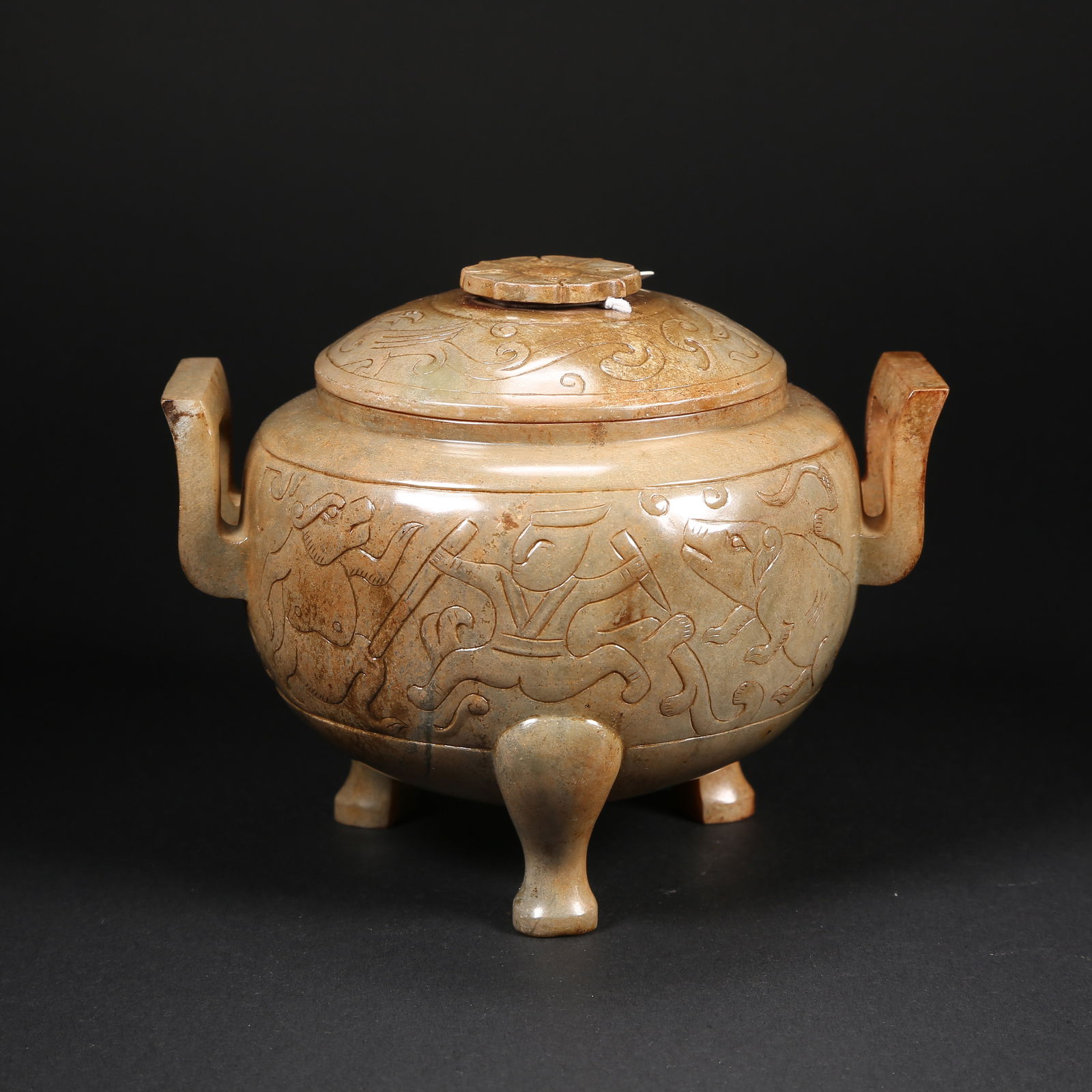 A HETIAN JADE CENSER WITH HUNTING SCENE AND DRAGON–PHOENIX LID: Hetian jade censer with hunting scene and dragon–phoenix lid