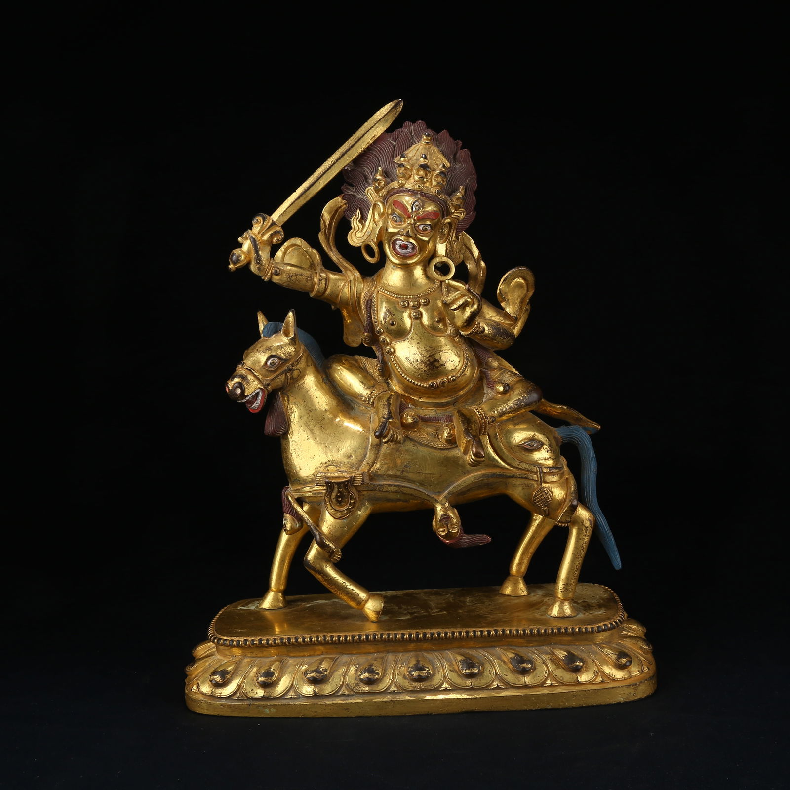 A GILT BRONZE PALDEN LHAMO (GLORIOUS GODDESS) STATUE: Gilt bronze Palden Lhamo (Glorious Goddess) statue