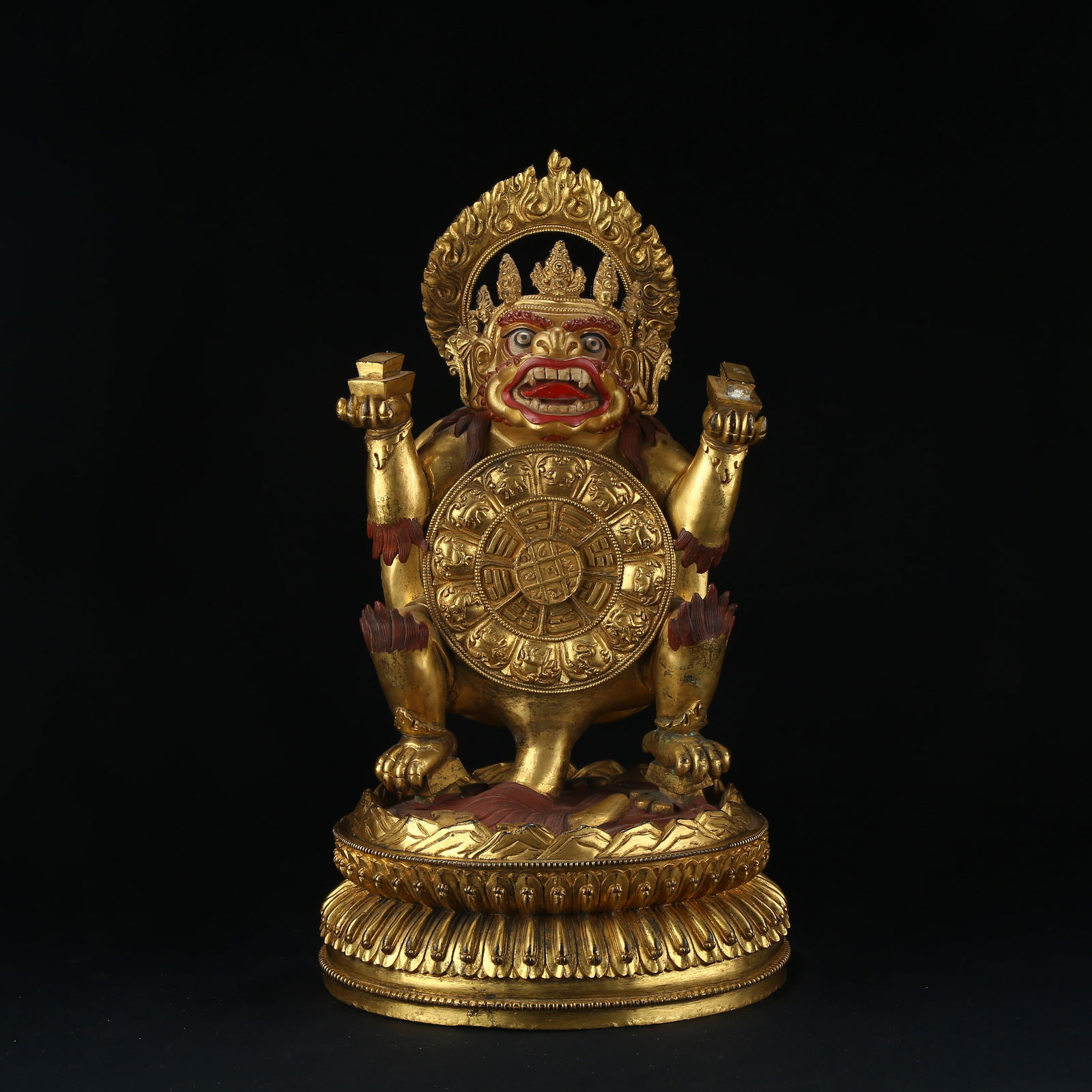 A GILT BRONZE WHEEL OF SIX REALMS (SA?S?RA) STATUE: Gilt bronze Wheel of Six Realms (Sa?sara) statue