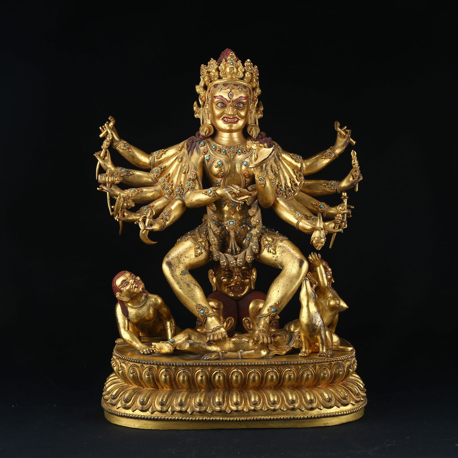 A GILT BRONZE BUDDHA STATUE INLAID WITH GEMSTONES: Gilt bronze Buddha statue inlaid with gemstones