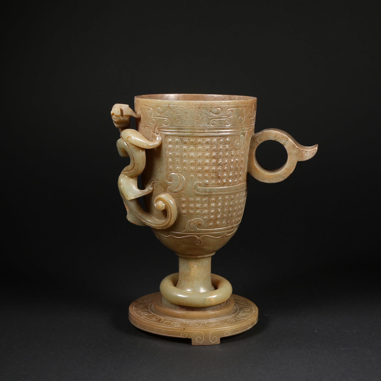 A SET OF TWO HETIAN JADE CHI-DRAGON CUPS WITH MOVABLE RINGS: Set of two Hetian jade chi-dragon cups with movable rings