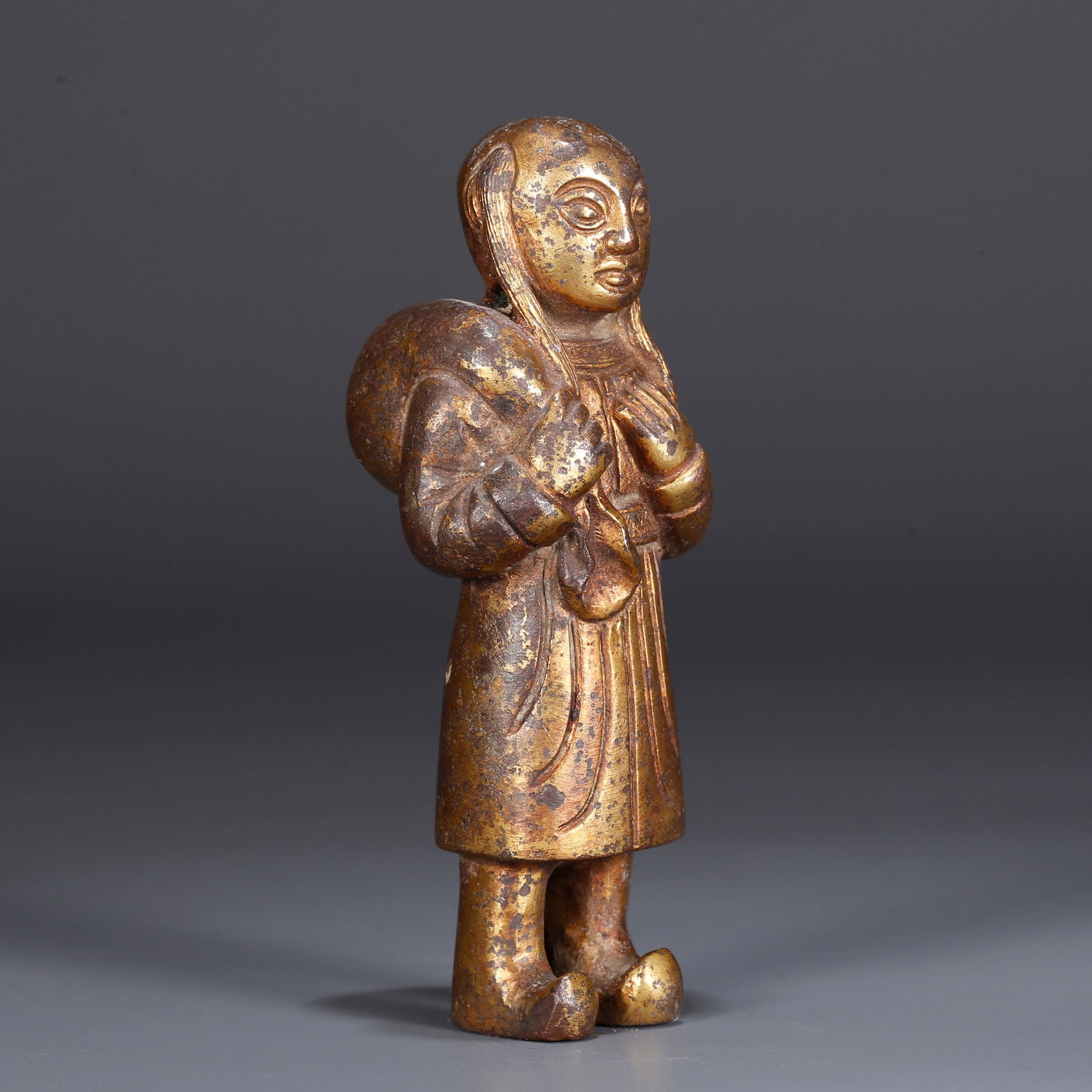 A GILDED BRONZE FIGURINE: Gilded Bronze Figurine