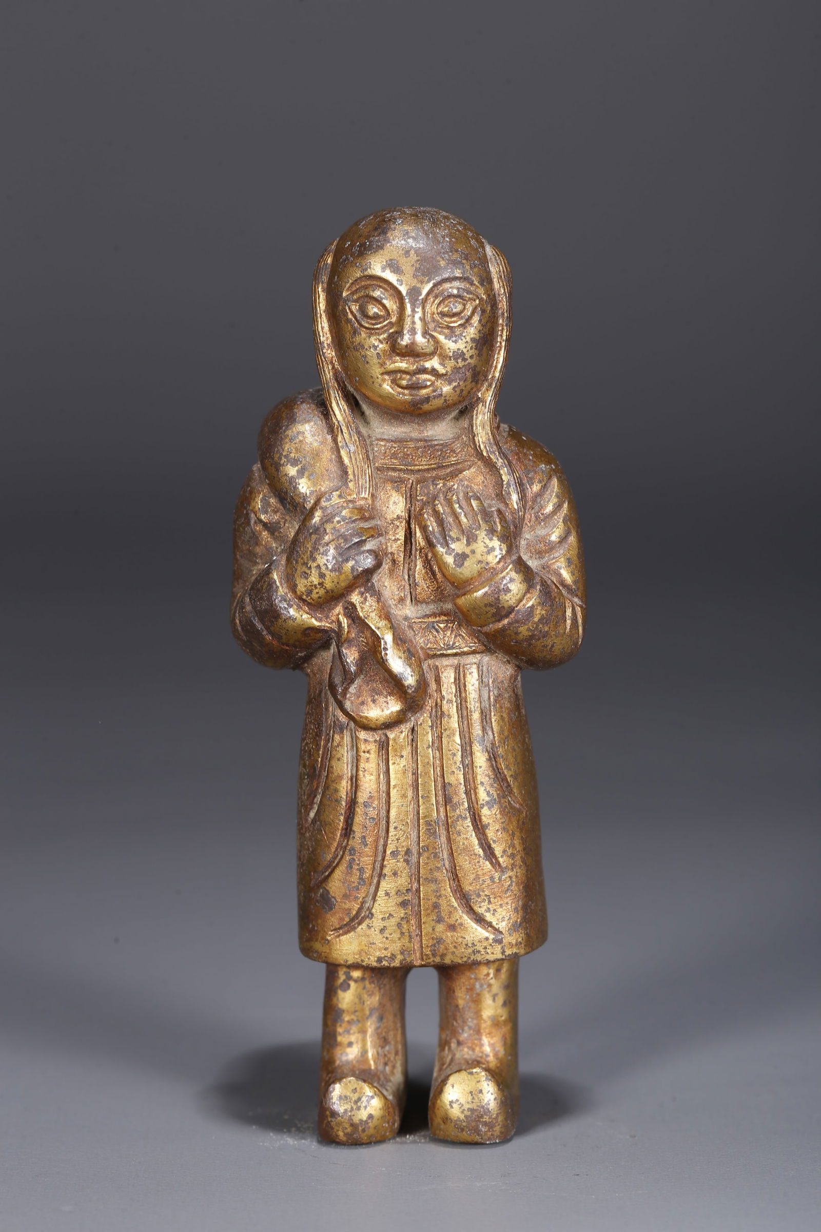 A GILDED BRONZE FIGURINE - 4