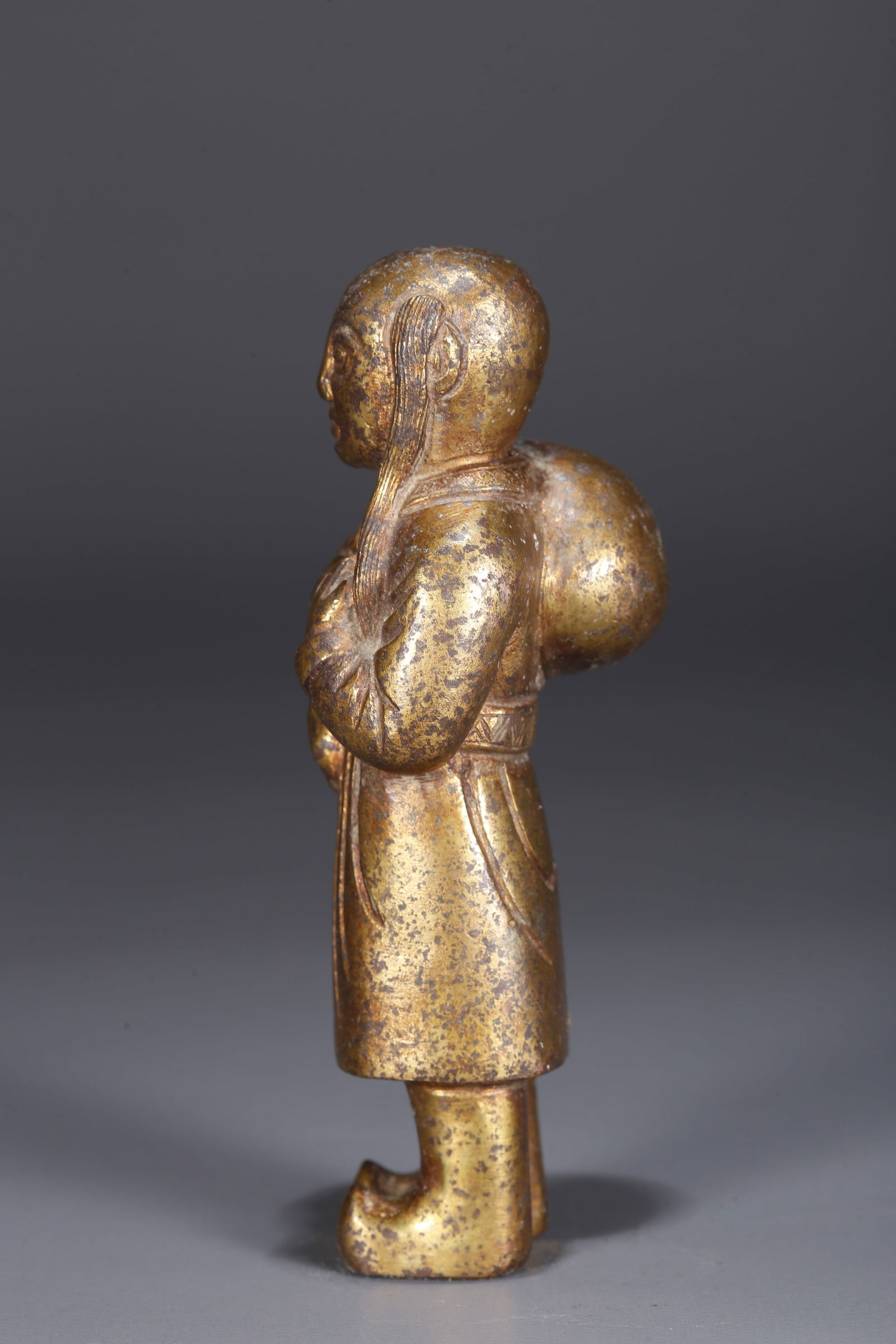 A GILDED BRONZE FIGURINE - 5