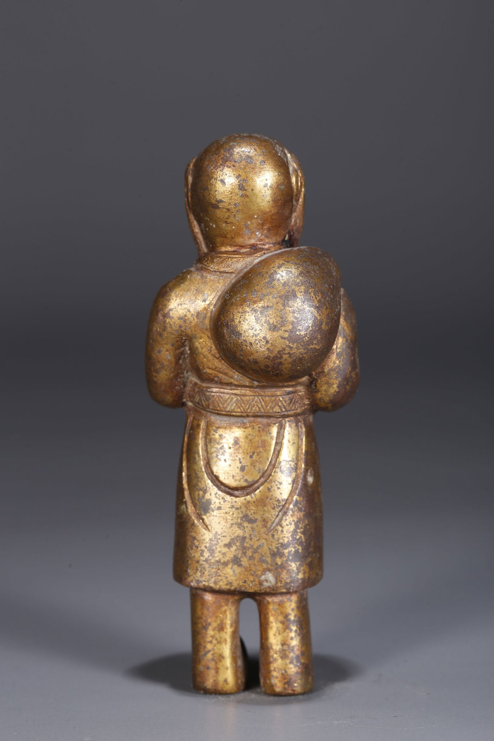 A GILDED BRONZE FIGURINE - 6