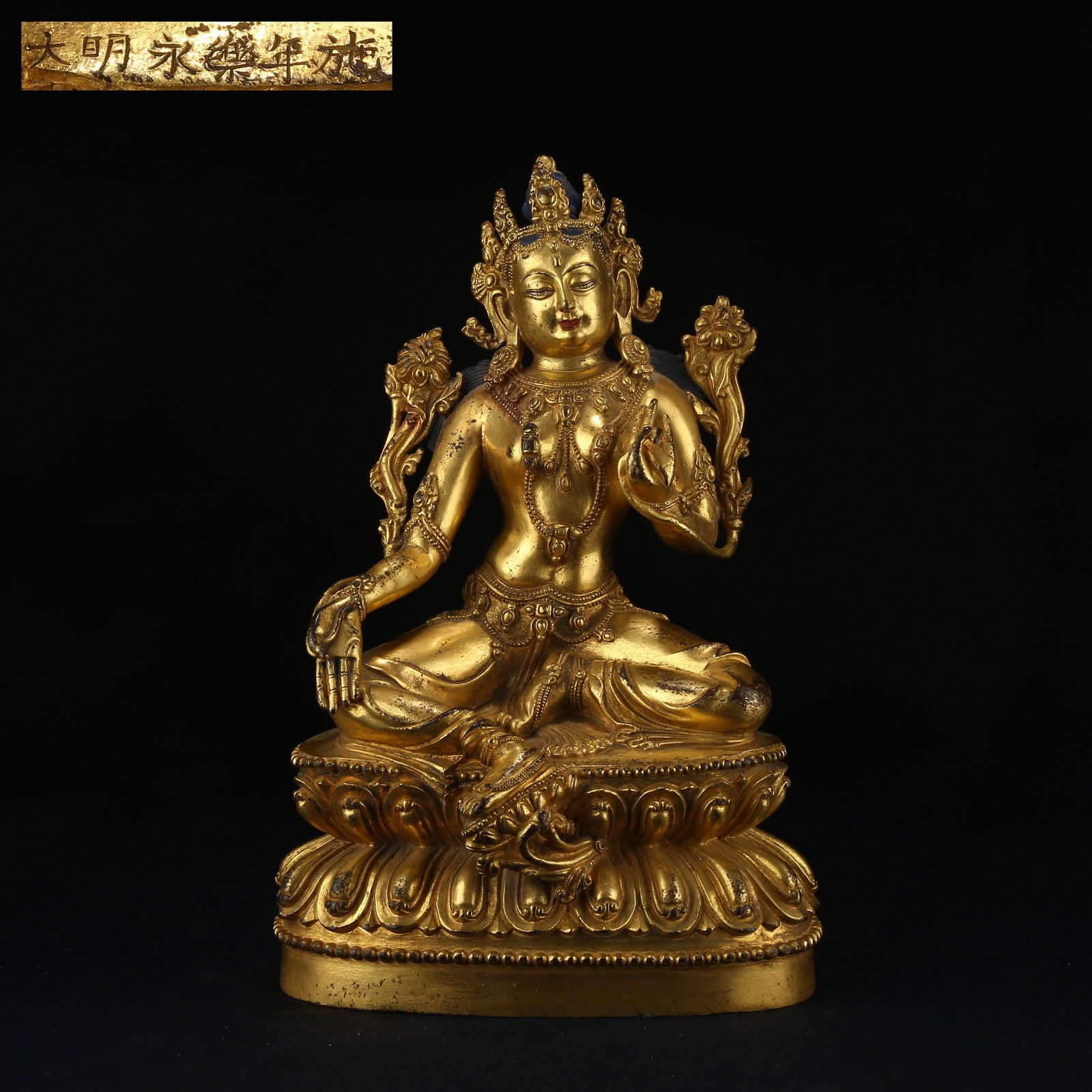 A GILT BRONZE GREEN TARA STATUE: Gilt bronze Green Tara statue