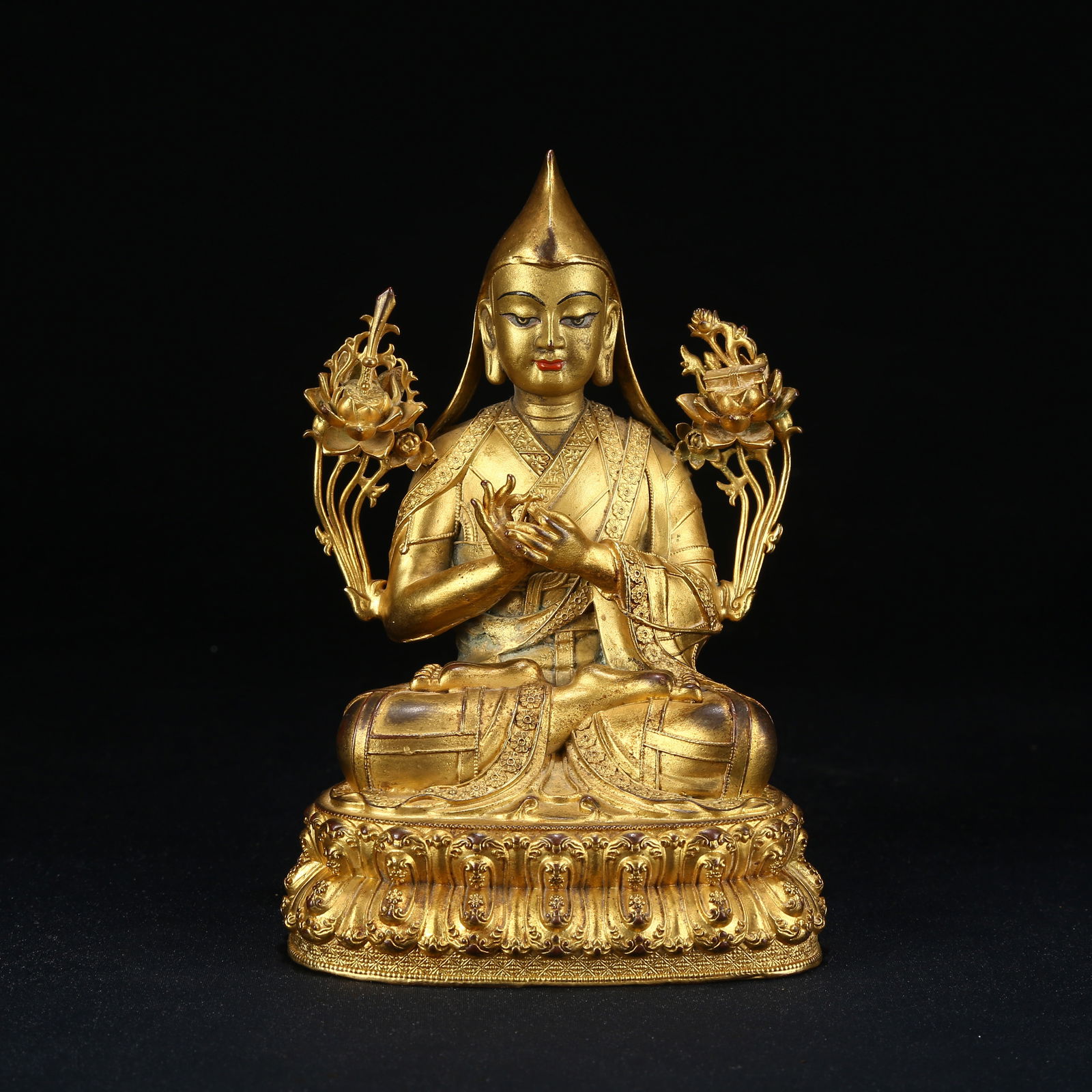 A GILT BRONZE STATUE OF TSONGKHAPA: Gilt bronze statue of Tsongkhapa