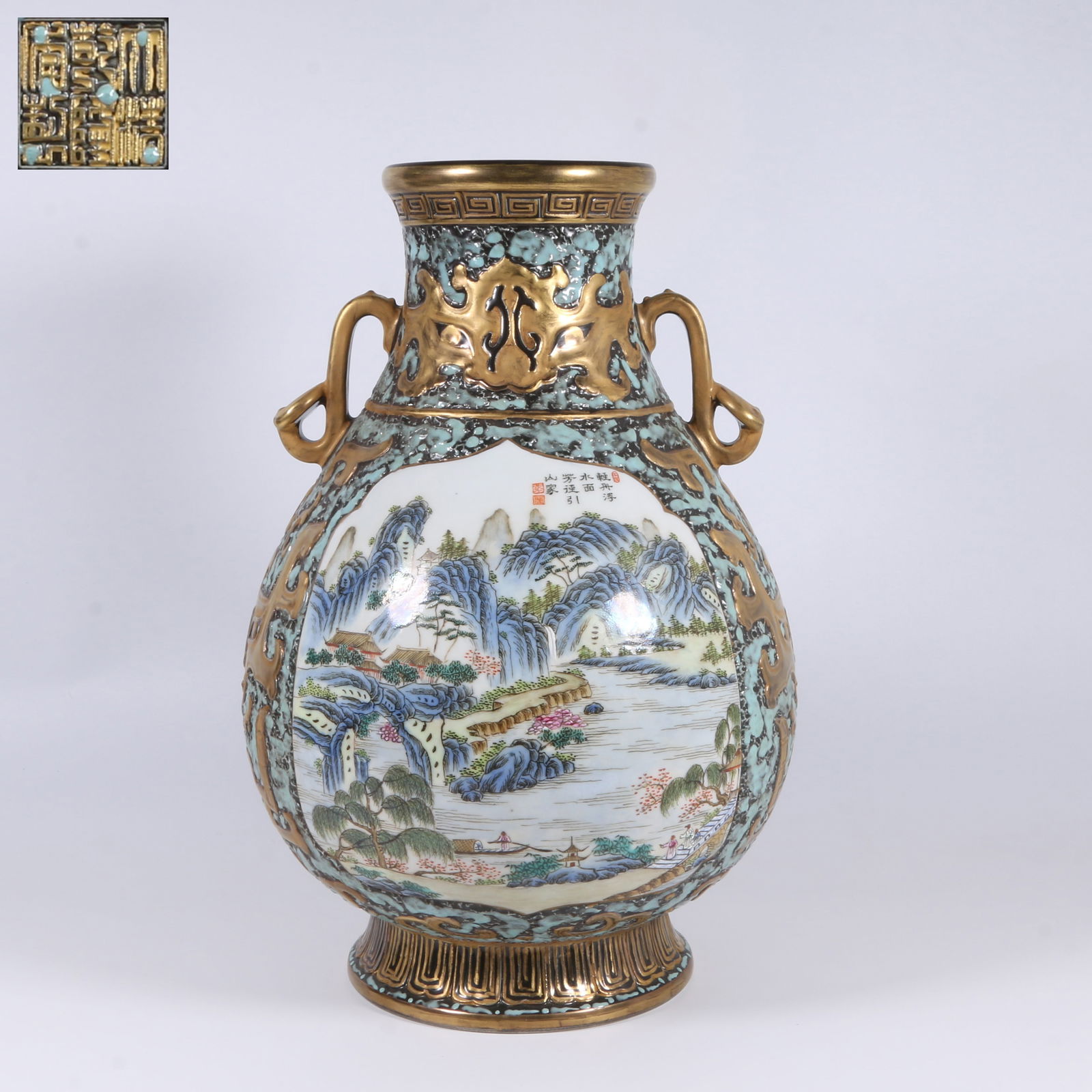 A FAMILLE ROSE VASE WITH DOUBLE RUYI HANDLES AND LANDSCAPES AND FIGURES IN PANELS: Famille Rose Vase with Double Ruyi Handles and Landscapes and Figures in Panels