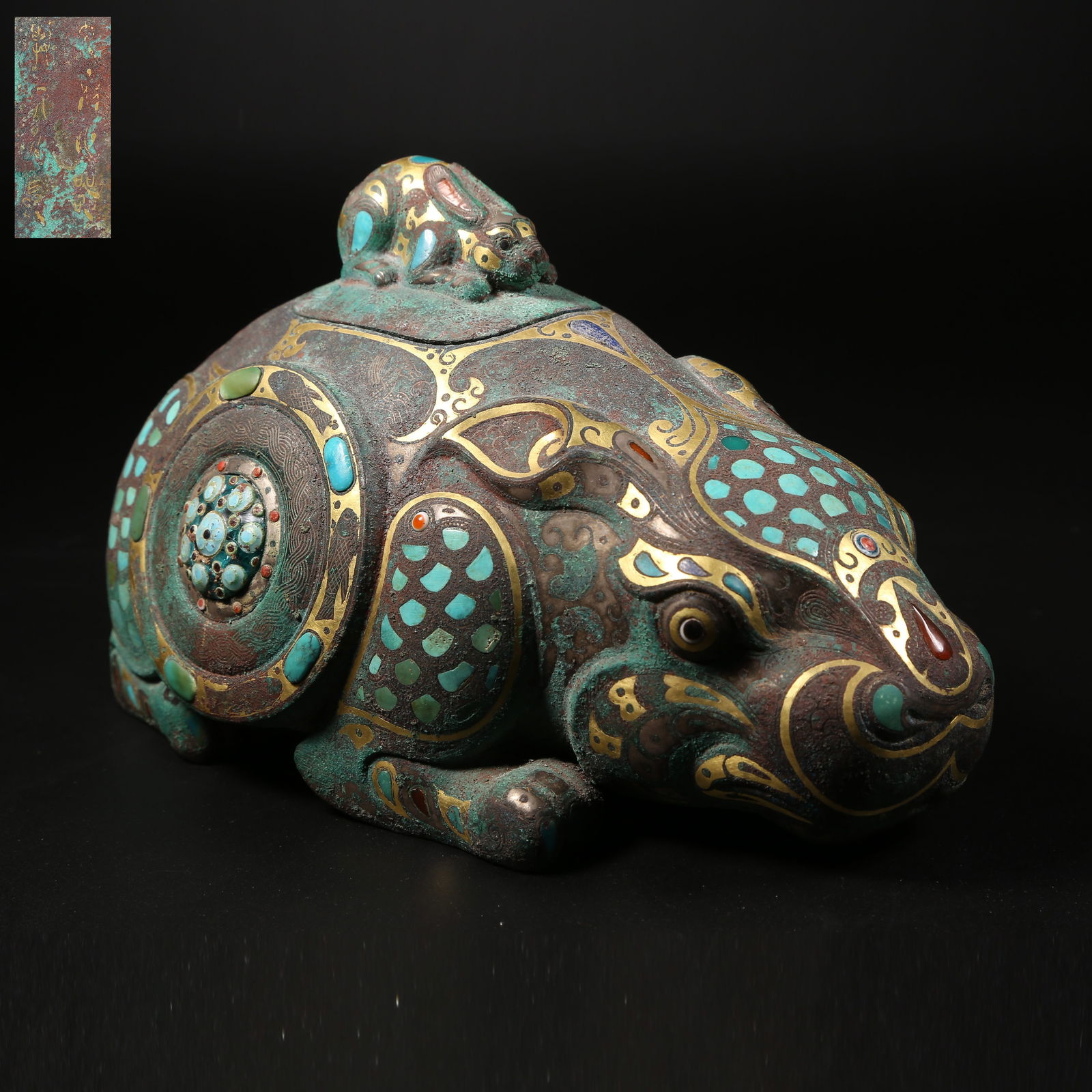 A GILT-AND-INLAID BRONZE RABBIT-SHAPED INCENSE BURNER: Gilt-and-inlaid bronze rabbit-shaped incense burner