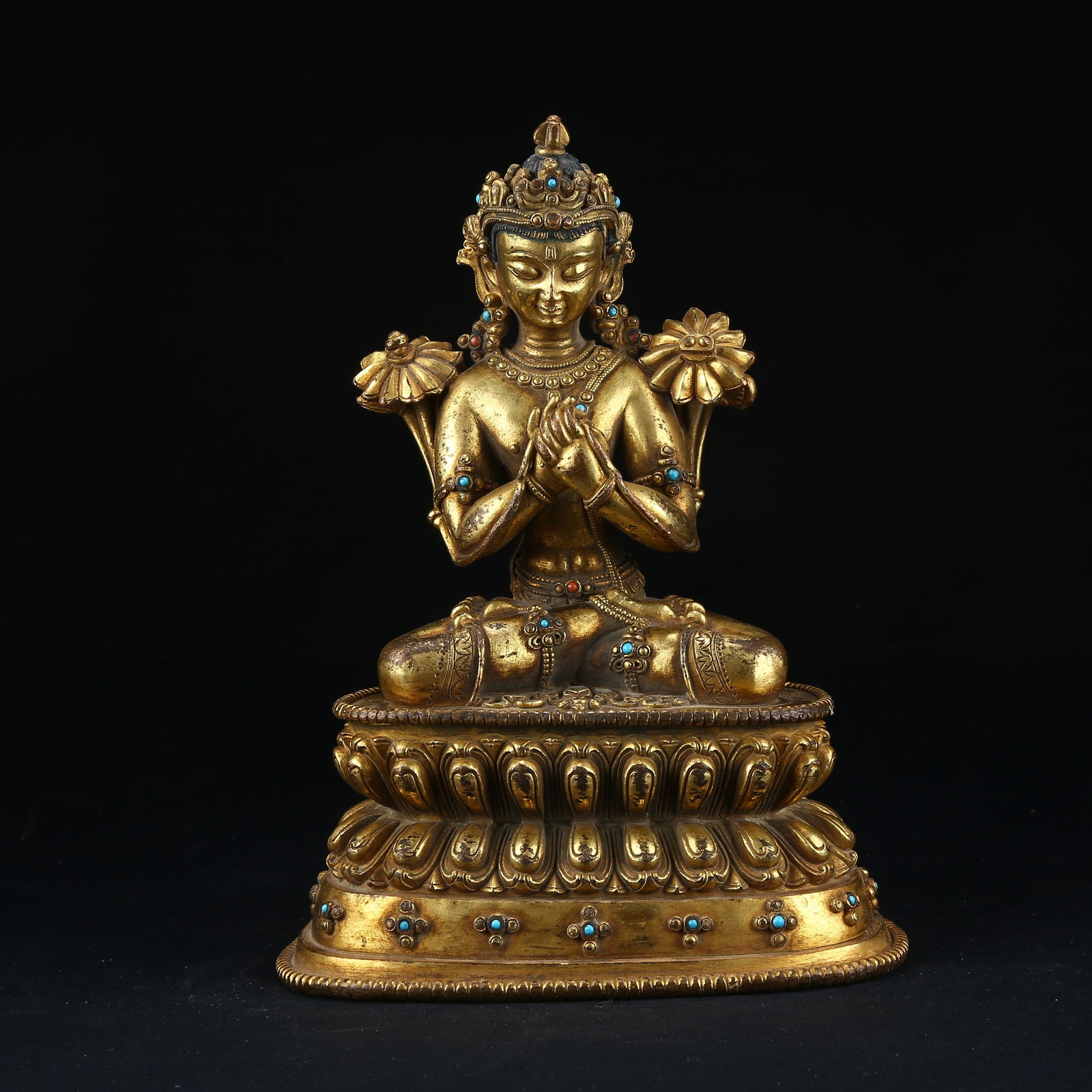 A GILT BRONZE MANJUSHRI BODHISATTVA STATUE INLAID WITH GEMSTONES: Gilt bronze Manjushri Bodhisattva statue inlaid with gemstones