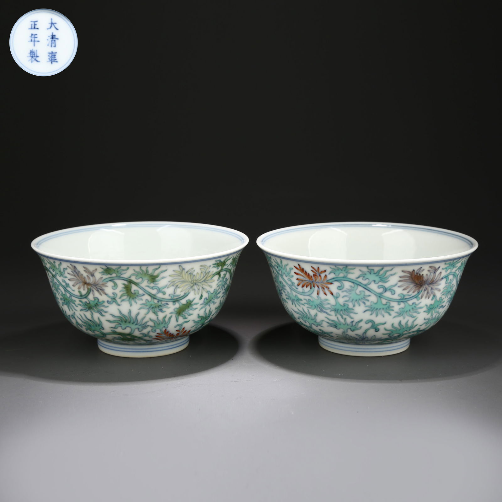 A SET OF DOUCAI BOWLS WITH SCROLLING GRASS PATTERN: Set of doucai bowls with scrolling grass pattern